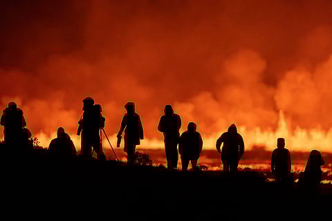 Iceland Volcano Eruption: Tourists and visitors try to get a view of the eruption